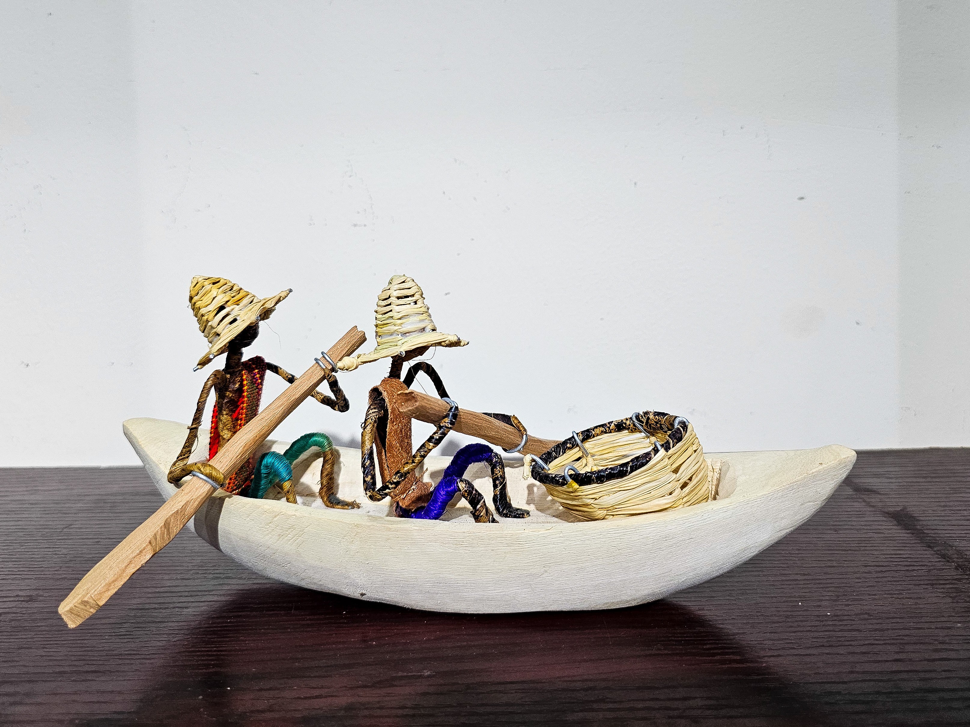 African Canoe + Passengers