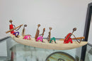 African Canoe + Passengers
