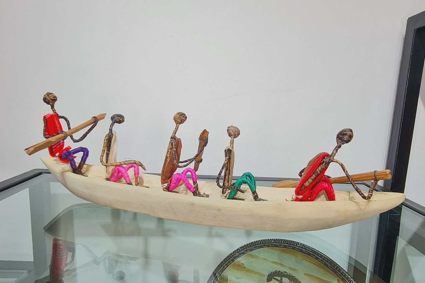 African Canoe + Passengers