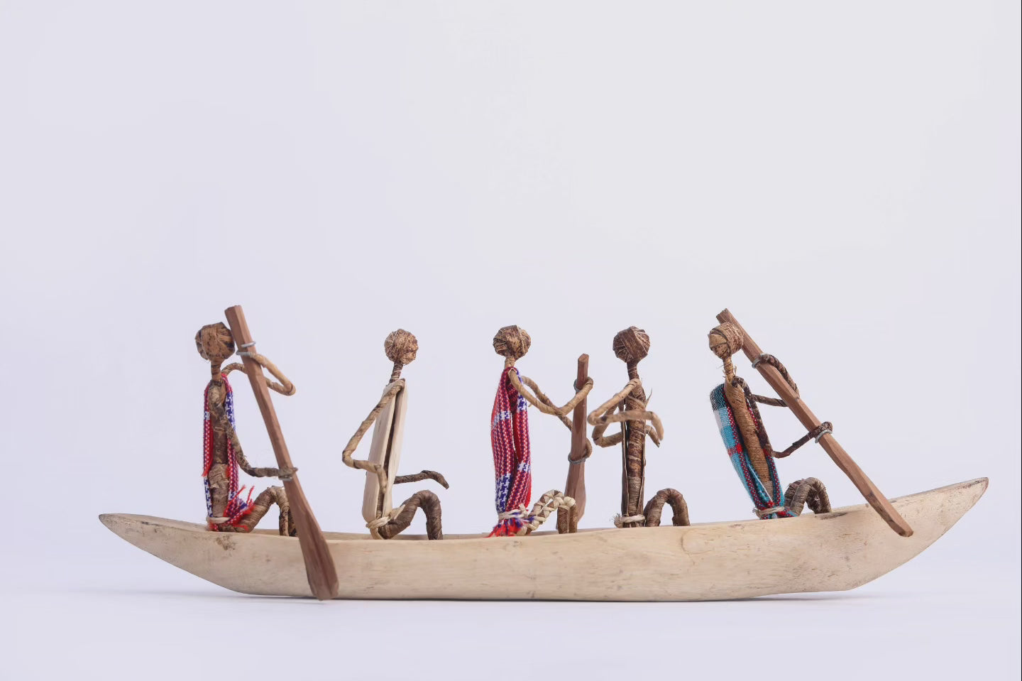 African Canoe + Passengers